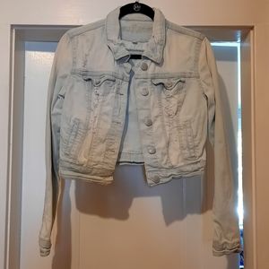 Distressed denim jacket